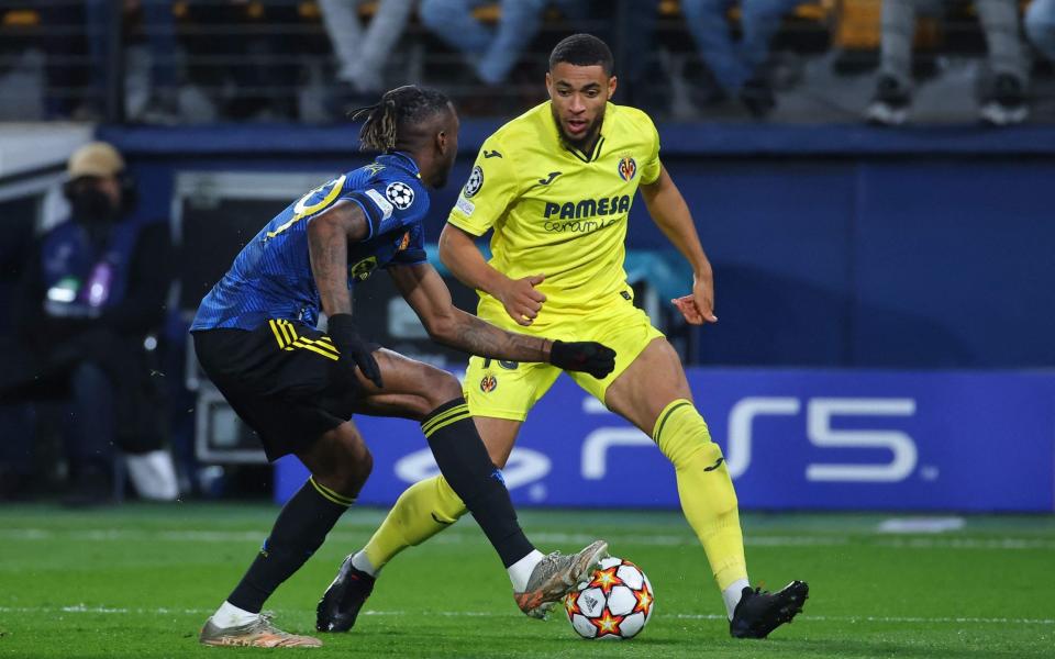 Aaron Wan-Bissaka (left) and Arnaut Danjuma - How Manchester United’s out-of-form players performed under Michael Carrick - AFP