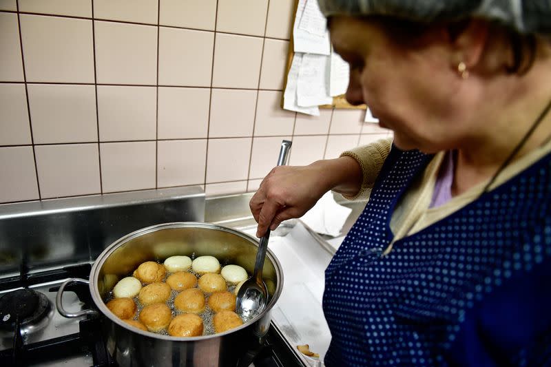 Hasidic Jewish refugees from Ukraine celebrate Hanukkah at a kosher shelter on the banks of Hungary's Lake Balaton