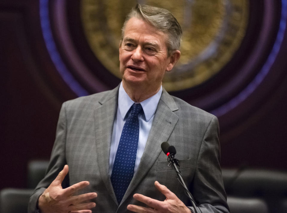 FILE - In this Jan. 3, 2019 photo, Idaho Gov.-elect Brad Little answers a reporter's question at the State Capitol building in Boise, Idaho. Voters in several states dominated politically by Republicans have passed ballot initiatives in recent years to expand Medicaid, legalize marijuana, raise the minimum wage and reform the redistricting process. (AP Photo/Otto Kitsinger, File)