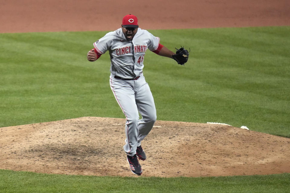Cincinnati Reds pitcher Michael Feliz celebrates after striking out St. Louis Cardinals' Paul Goldschmidt to end a baseball game Friday, June 4, 2021, in St. Louis. The Reds won 6-4. (AP Photo/Jeff Roberson)