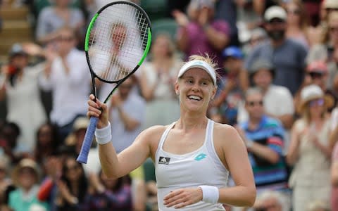 Alison Riske celebrates defeating Australia's Ashleigh Barty in a women's singles match during day seven of the Wimbledon Tennis Championships in London - Credit: Ben Curtis/AP