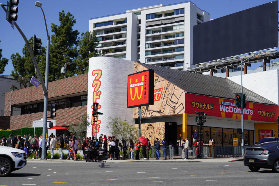 A painted brick building with Japanese yellow gold and red font and WcDonald's signage. (Samantha Kubota / TODAY)