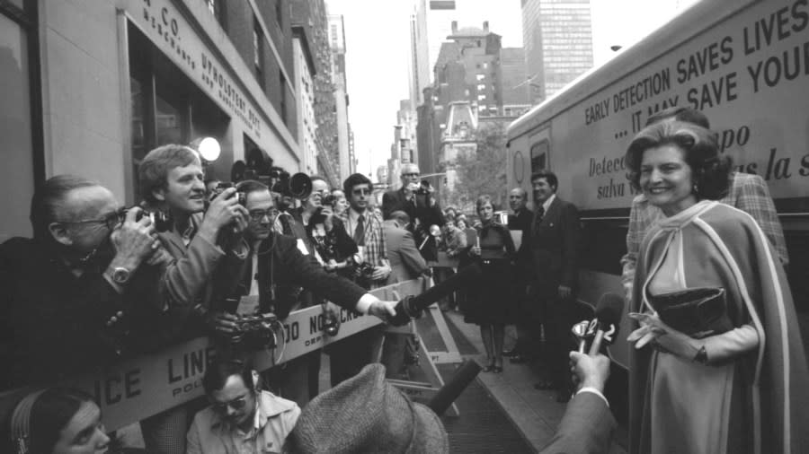 First Lady Betty Ford takes questions from the press prior to a tour at the Guttman Institute for Early Detection of Breast Cancer on Nov. 7, 1975, in New York City. (Courtesy Gerald R. Ford Presidential Library & Museum)