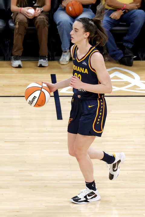 INDIANAPOLIS, IN – MAY 09: Indiana Fever guard Caitlin Clark brings the ball up court against the Atlanta Dream during a WNBA preseason game on May 9, 2024, at Gainbridge Fieldhouse in Indianapolis, Indiana. (Photo by Brian Spurlock/Icon Sportswire via Getty Images)