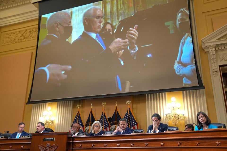 A photograph of Mike Pence as the secret service tried to evacuate him from the capital is projected onto a screen during the House select committee to investigate the Jan.6th attack on June 16, 2022.