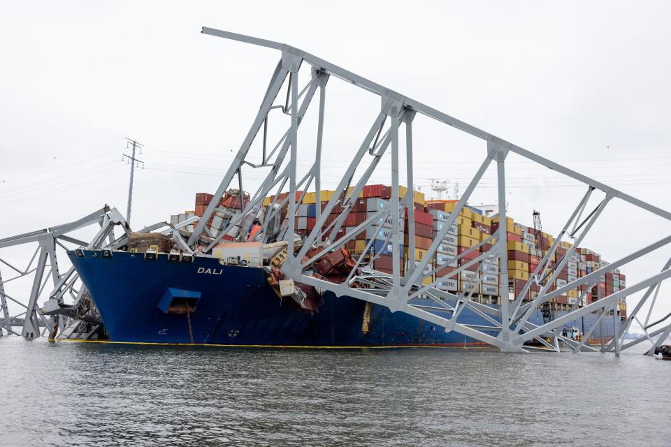 Wreckage from the collapsed Francis Scott Key Bridge rests on the cargo ship Dali (Getty Images)
