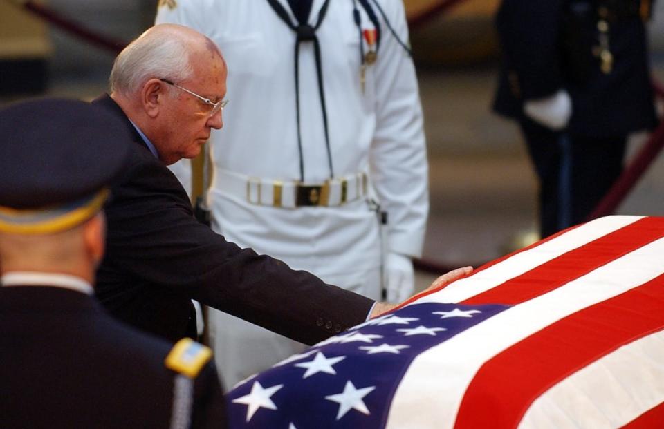 <div class="inline-image__title">156374770</div> <div class="inline-image__caption"><p>The former leader of the Soviet Union Mikhail Gorbachev touches the casket containing the remains of former U.S. President Ronald Reagan at the Rotunda of the Capitol Building in Washington, D.C. on June 10, 2004. </p></div> <div class="inline-image__credit">ROBERTO SCHMIDT/AFP via Getty Images</div>