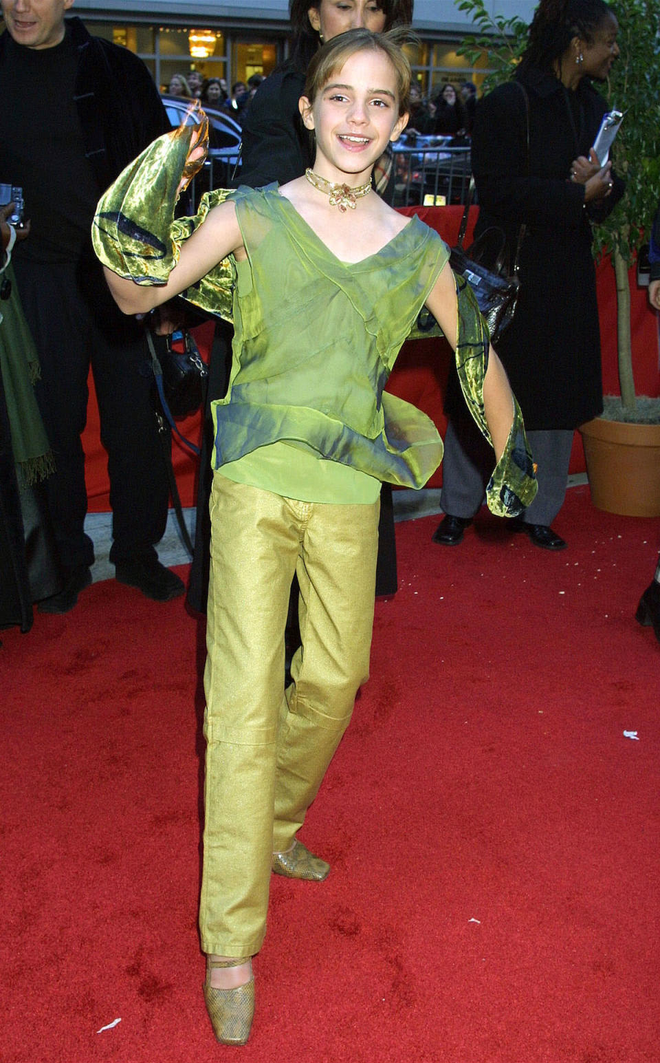<p>Watson is giddy and green as she attends the premiere of <em>Harry Potter and the Sorcerer’s Stone</em> on Nov. 11, 2001. (Photo: Getty Images) </p>