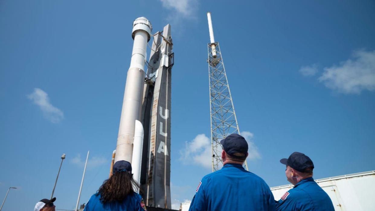 <div>CAPE CANAVERAL, FL - MAY 18: In this handout photo provided by NASA, NASA astronauts (L-R) Suni Williams, Barry "Butch" Wilmore, and Mike Fincke watch as a United Launch Alliance Atlas V rocket with Boeings CST-100 Starliner spacecraft aboard is rolled out of the Vertical Integration Facility to the launch pad at Space Launch Complex 41 ahead of the Orbital Flight Test-2 (OFT-2) mission on May 18, 2022 in Cape Canaveral, Florida. (Photo by Joel Kowsky/NASA via Getty Images)</div>