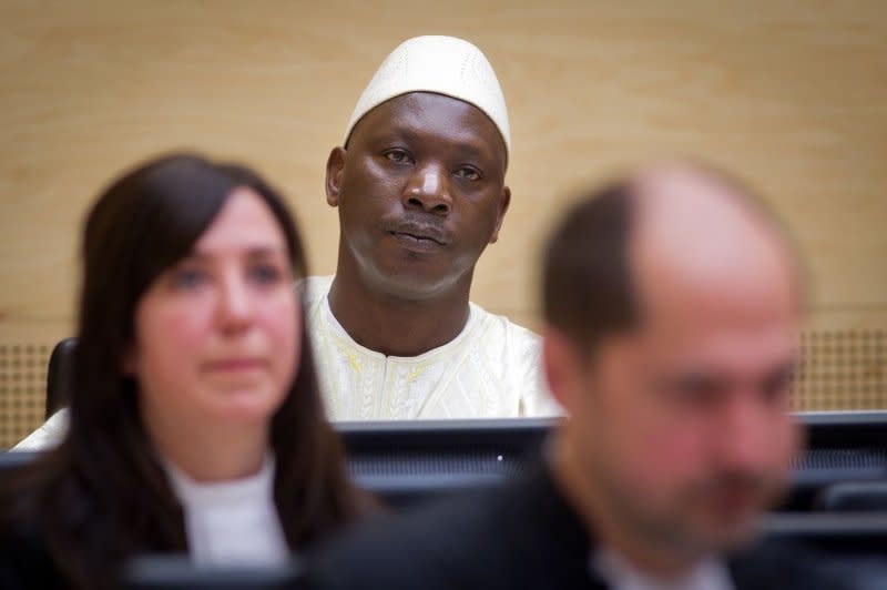 Former Congolese rebel commander Thomas Lubanga (C) sits in a court room in the International Criminal Court in the Hague, Netherlands, on March 14, 2012. File Photo by Evert-Jan Daniels/EPA