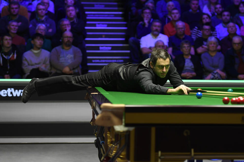 YORK, ENGLAND - DECEMBER 05: Ronnie O'Sullivan plays a shot during his match against Ding Junhui in the fourth round of the Betway UK Championship at The Barbican on December 05, 2019 in York, England. (Photo by George Wood/Getty Images)