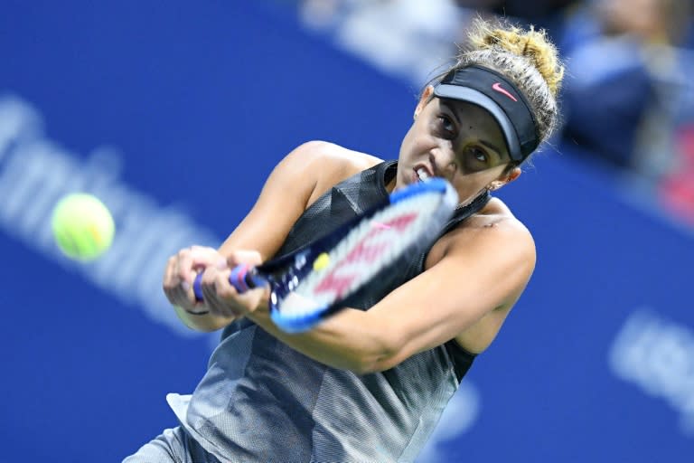 Madison Keys of the US hits a return to compatriot CoCo Vandeweghe during their 2017 US Open semi-final match, at the USTA Billie Jean King National Tennis Center in New York, on September 7