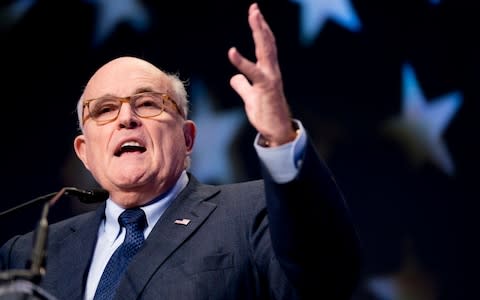 Rudy Giuliani has continued to make public allegations about Joe Biden's behaviour in Ukraine since the impeachment inquiry was launched - Credit: Andrew Harnik/AP