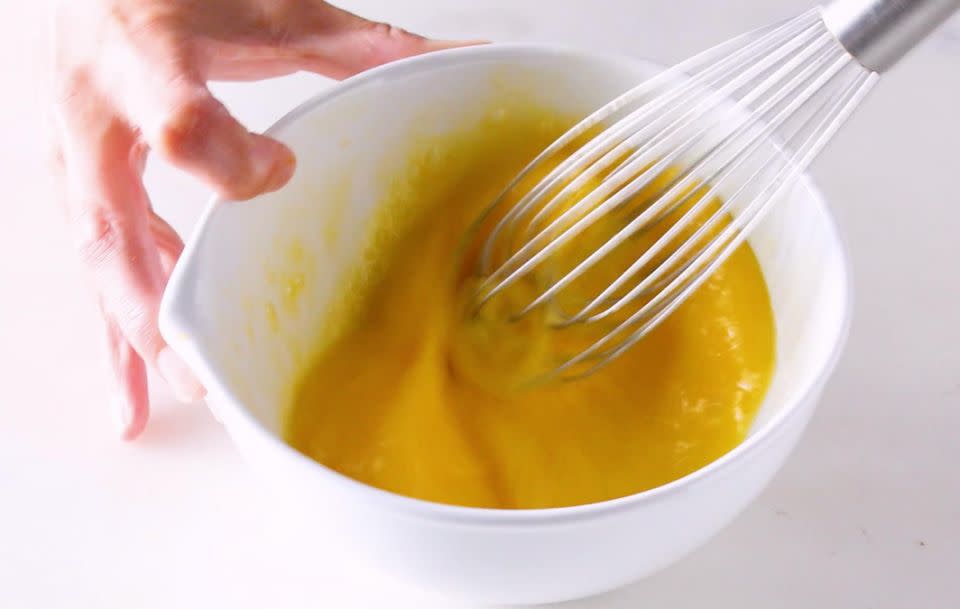 Then beat your eggs with a whisk as you would normally. Source: Food52 / Vimeo