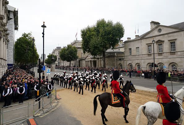 LONDON, ENGLAND - SEPTEMBER 19:Members of a military band pass through Whitehall ahead of the State Funeral of Queen Elizabeth II at Westminster Abbey on September 19, 2022 in London, England.  Elizabeth Alexandra Mary Windsor was born in Bruton Street, Mayfair, London on 21 April 1926. She married Prince Philip in 1947 and ascended the throne of the United Kingdom and Commonwealth on 6 February 1952 after the death of her Father, King George VI. Queen Elizabeth II died at Balmoral Castle in Scotland on September 8, 2022, and is succeeded by her eldest son, King Charles III. (Photo by David Davies - WPA Pool/Getty Images)