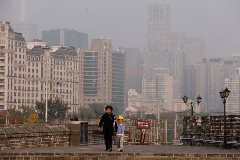 FILE PHOTO: Beijing issues orange alert for heavy air pollution