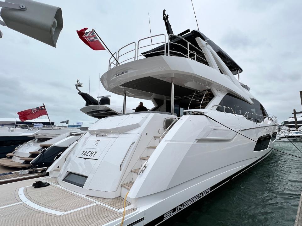 A rear three-quarters view of a Sunseeker 76 yacht