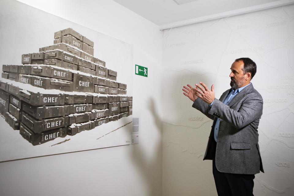 In this photo taken on Thursday, March 21, 2019, Dmitry Aksenov, property developer and art collector gestures while speaking during an interview with The Associated Press in Moscow, Russia. A physicist by training, Aksenov took a scientific approach once he decided to collect art and set about studying cultural history to train his eye. (AP Photo/Alexander Zemlianichenko Jr.)