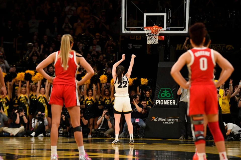 PHOTO:Iowa guard Caitlin Clark sinks a technical foul to become the all-time leading scorer in NCAA Division I basketball during the first half of a college game against Ohio State, Iowa City, IA, Mar. 3, 2024. (Cliff Jette/AP)
