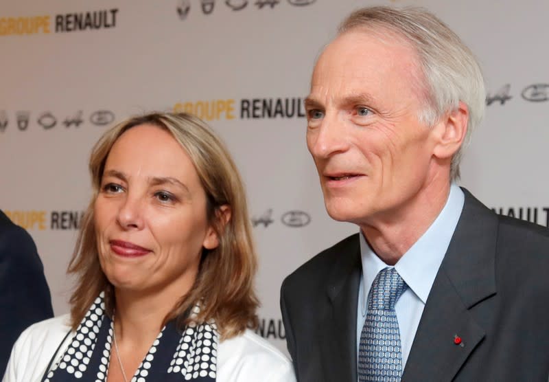 FILE PHOTO: Newly-appointed interim CEO Delbos and Chairman of Renault SA Senard pose before a news conference at French carmaker Renault headquarters in Boulogne-Billancourt