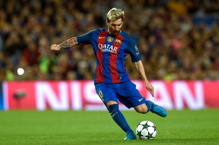 Barcelona's Argentinian forward Lionel Messi kicks the ball during the UEFA Champions League football match FC Barcelona vs Manchester City at the Camp Nou stadium in Barcelona on October 19, 2016