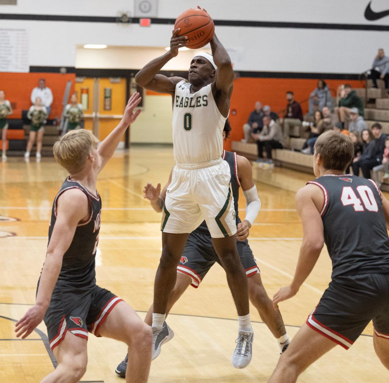 GlenOak's Ja’Corey Lipkins looks to make a play vs. Mentor.