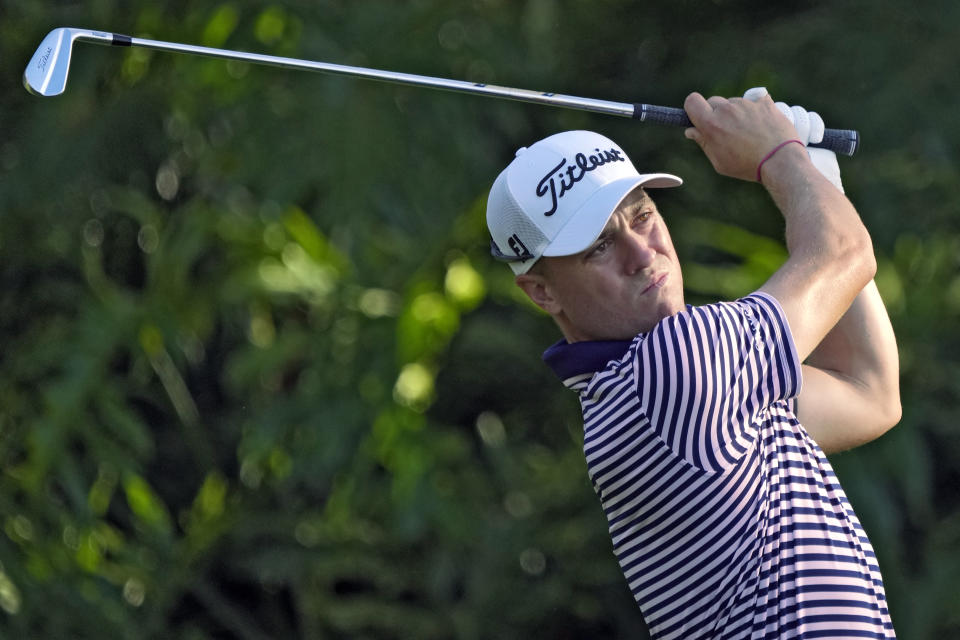 Justin Thomas watches his shot on the 13th tee during the second round of The Players Championship golf tournament Friday, March 15, 2024, in Ponte Vedra Beach, Fla. (AP Photo/Lynne Sladky)