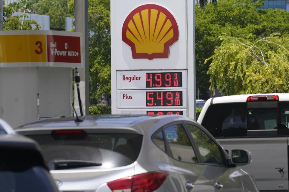 FILES - Cars line up at a Shell gas station June 17, 2022, in Miami. President Joe Biden on June 22 will call on Congress to suspend the federal gasoline and diesel taxes for three months. It's a move meant to ease financial pressures at the pump that also reveals the political toxicity of high gas prices in an election year. (AP Photo/Marta Lavandier, File)