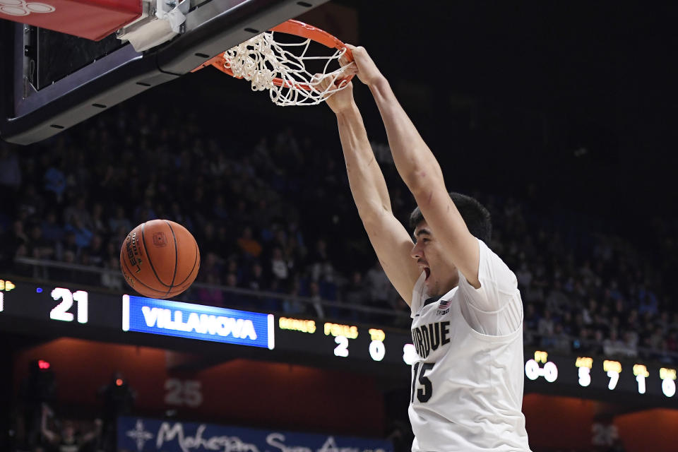 Purdue's Zach Edey (15) dunks in the first half of an NCAA college basketball game against Villanova, Sunday, Nov. 21, 2021, in Uncasville, Conn. (AP Photo/Jessica Hill)