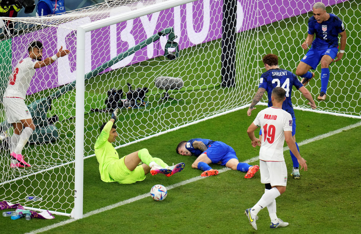 Christian Pulisic of the United States was injured during the Group B match between Iran and the United States on November 29, 2022. (Meng Dingbo/Xinhua / Getty Ima)