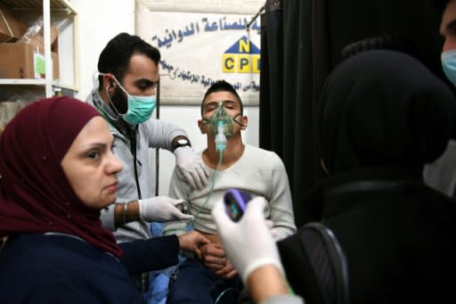 A Syrian boy receives treatment on November 24, 2018 at a hospital in Aleppo where the regime accused armed groups of carrying out a "toxic gas" attack