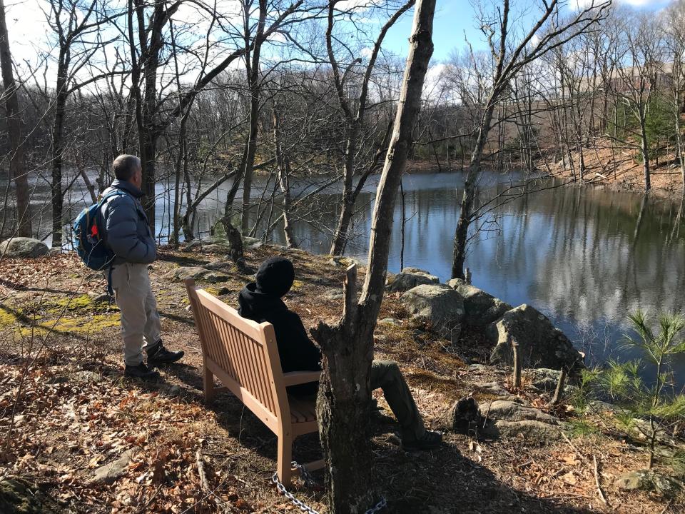 Birders can rest at benches on the pond’s banks to spot a variety of migratory birds, including Eastern towhees and prairie warblers.