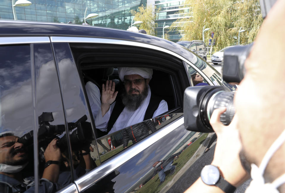 The Taliban delegation led by Amir Khan Muttaqi, the acting foreign minister, sit in a car at Esenboga Airport, in Ankara, Turkey, Thursday, Oct. 14, 2021. A high-level delegation of Afghanistan's new Taliban rulers has arrived in Turkey for talks with Turkish officials, the Foreign Ministry announced Thursday. The meetings in the capital of Ankara would be first between the Taliban and senior Turkish government officials after the group seized control of Afghanistan. (AP Photo/Burhan Ozbilici)