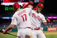 Apr 26, 2019; Philadelphia, PA, USA; Philadelphia Phillies right fielder Bryce Harper (3) reacts with left fielder Rhys Hoskins (17) after hitting a two RBI home run during the eighth inning against the Miami Marlins at Citizens Bank Park. Mandatory Credit: Bill Streicher-USA TODAY Sports