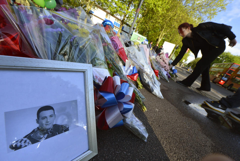 Tributes were left for weeks outside of Lee Rigby's former barracks. (PA)