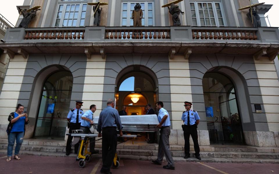 Just 15 people were present at the exhumation  - Credit: LLUIS GENE/AFP/Getty