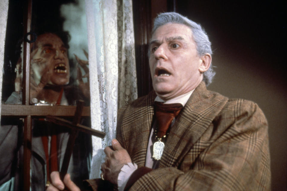 American actor Chris Sarandon and British actor Roddy McDowall on the set of Fright Night, written and directed by Tom Holland. (Photo by Columbia Pictures/Sunset Boulevard/Corbis via Getty Images)