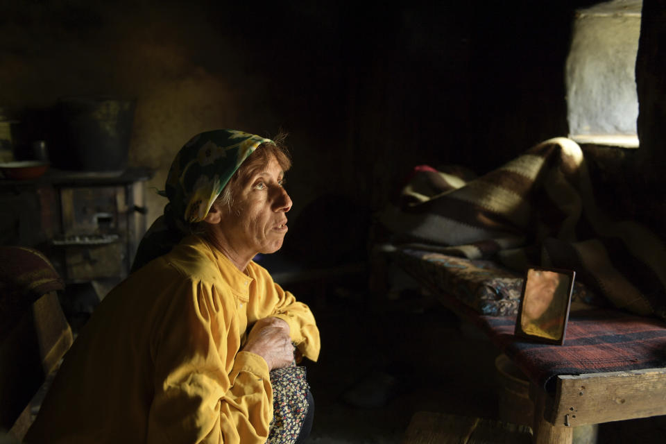 This image released by Neon shows Hatidze Muratova in a scene from "Honeyland," nominated for an Oscar for best documentary and best international feature film. (Neon via AP)