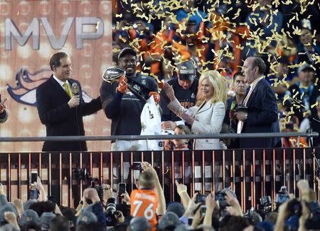 Feb 7, 2016; Santa Clara, CA, USA; Denver Broncos outside linebacker Von Miller (58) celebrates with the Vince Lombardi Trophy as he is named MVP after Super Bowl 50 against the Carolina Panthers at Levi's Stadium. Mandatory Credit: Robert Hanashiro-USA TODAY Sports -