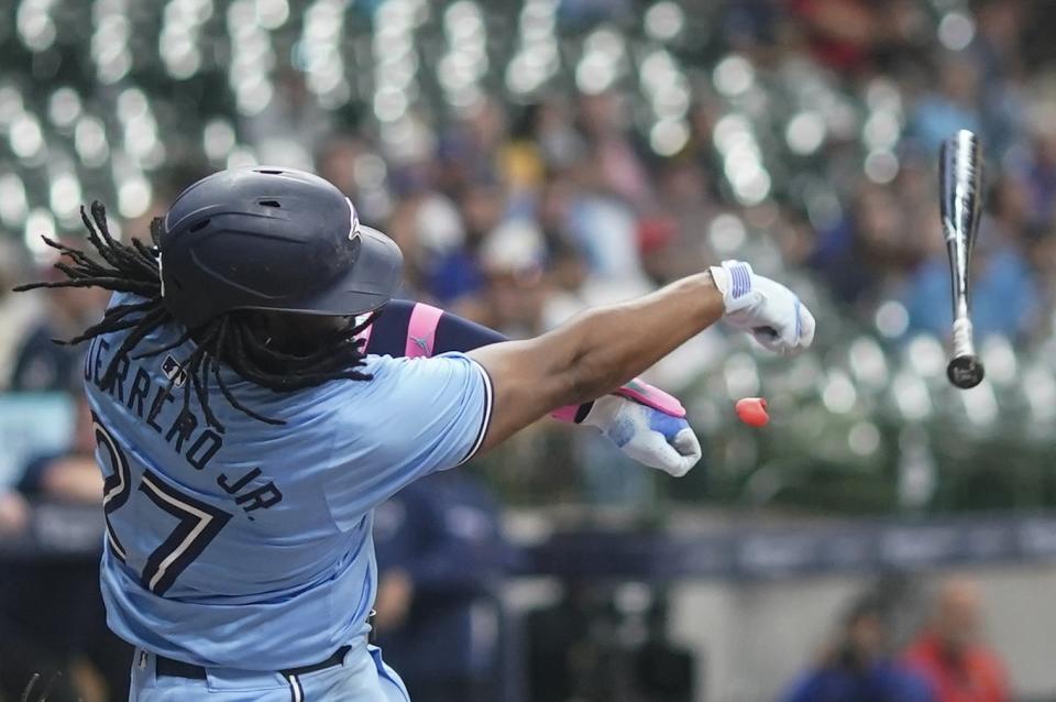 Toronto Blue Jays' Vladimir Guerrero Jr. loses his bat during the fourth inning of a baseball game against the Milwaukee Brewers Monday, June 10, 2024, in Milwaukee. (AP Photo/Morry Gash)