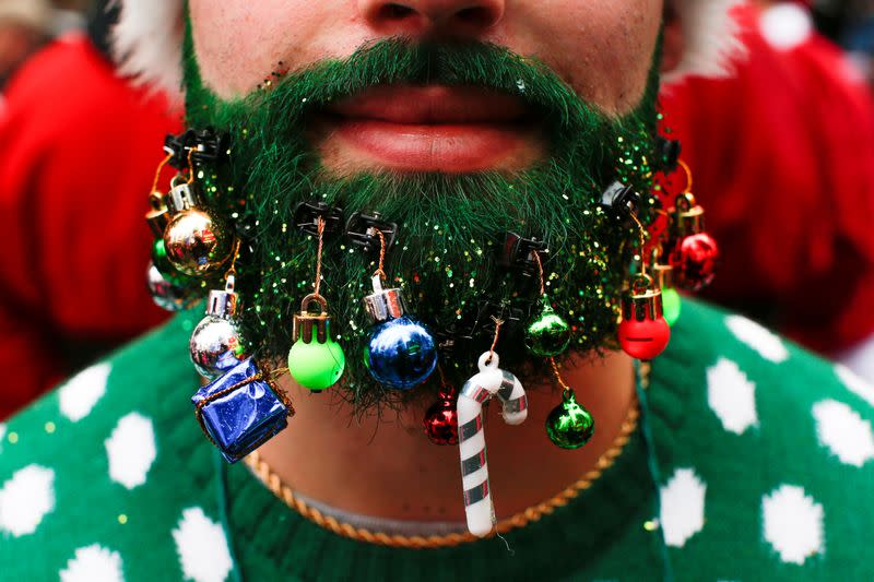 FILE PHOTO: A reveler takes part in the event called SantaCon at Times Square in New York