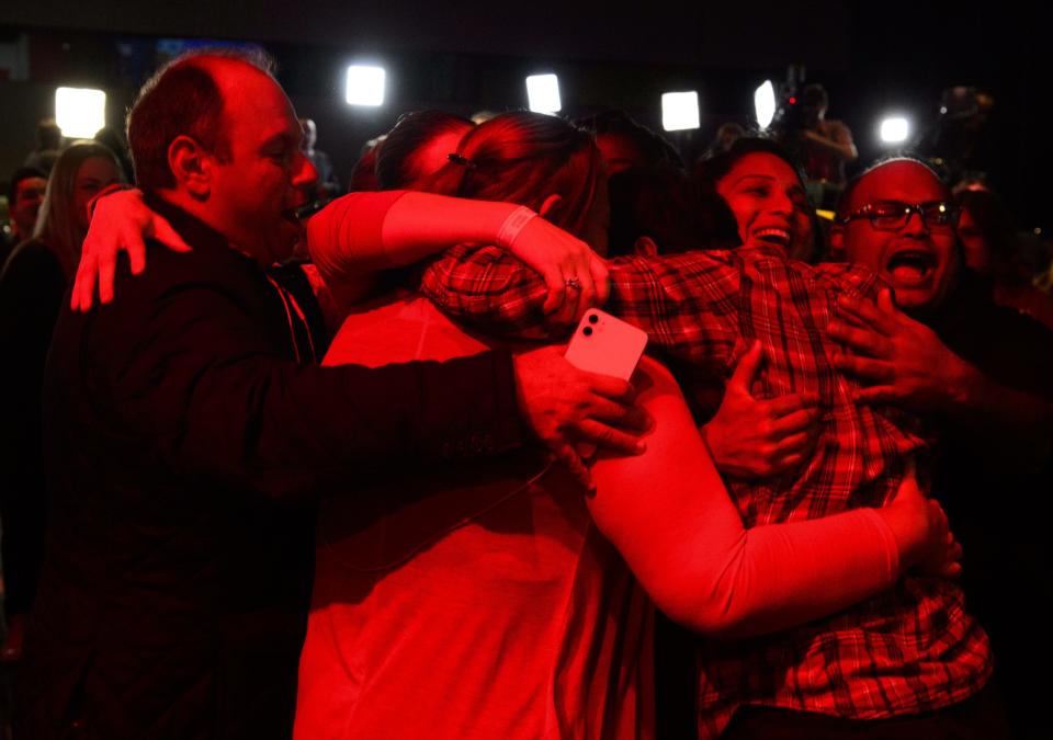 Liberals supporters react to win