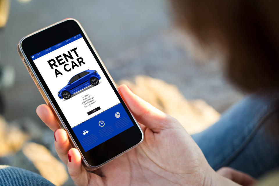 A smart phone showing "Rent a car"