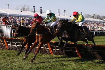 Britain Horse Racing - Grand National Festival - Aintree Racecourse - 8/4/17 Barry Geraghty on Yanworth (C) in action during the 4:20 Ryanair Stayers Liverpool Hurdle Reuters / Phil Noble Livepic