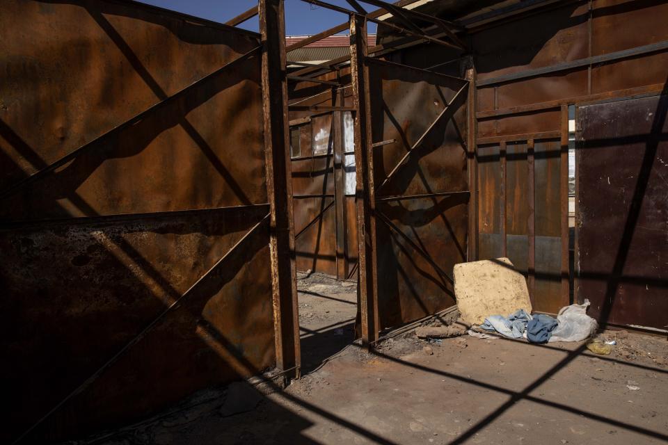 This Jan. 10, 2020 photo shows empty rooms inside a mosque compound where several women were beaten and raped during the June 3, 2019 paramilitary crackdown on a protest camp, in Khartoum, Sudan. Dozens of fleeing protesters took shelter in the mosque but security forces charged in, beating people. The fighters shouted insults and threats of rape, said Sara Ali Abdulla, a doctor who managed to get out of the mosque compound. “We heard women screaming and crying” as they were raped, she said. (AP Photo/Nariman El-Mofty)