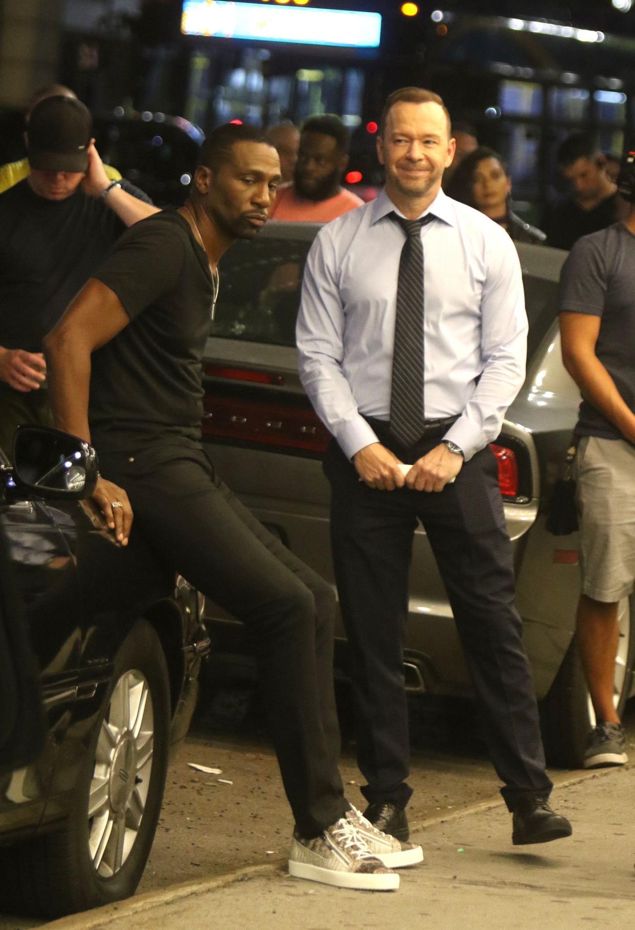 Donnie Wahlberg and Leon Robinson pictured filming a crime scene at the "Blue Bloods" set in Midtown, Manhattan on Wednesday, Sept. 4, 2019.