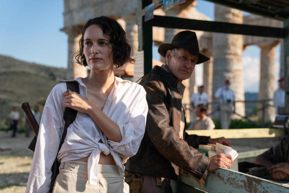 (L-R): Helena (Phoebe Waller-Bridge) and Indiana Jones (Harrison Ford) in Lucasfilm's Indiana Jones and the Dial of Destiny. ©2022 Lucasfilm Ltd. & TM. All Rights Reserved.