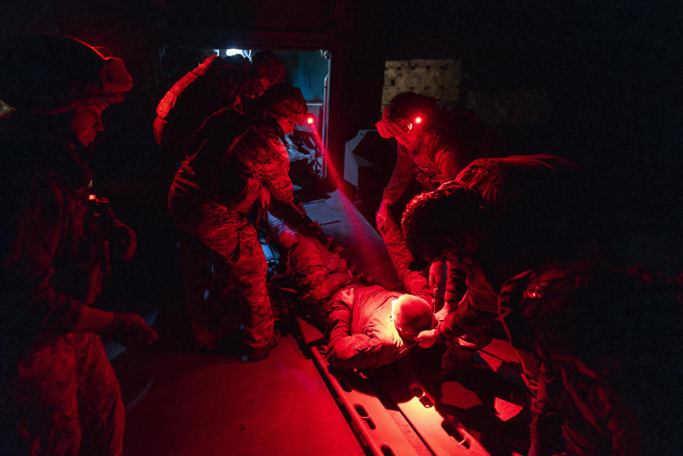 Ukrainian paramedics from 3rd Assault brigade carry a wounded comrade injured during battles in Andriivka, near Bakhmut, Donetsk region, Ukraine, Tuesday Sept. 12, 2023. When Ukrainian soldiers finally reclaimed Andriivka last week, it was at a high cost in lives. (AP Photo/Mstyslav Chernov)