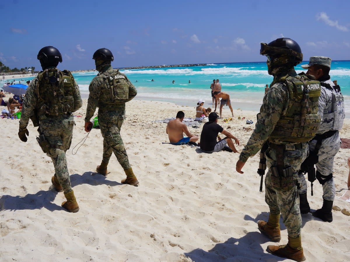 File photo: Members of the Mexican Navy and National Guard patrol the tourist beach area of Cancun, Quintana Roo state, Mexico on 18 March 2023 (AFP via Getty Images)