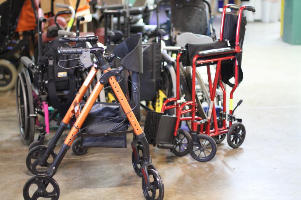 Rollators, rolling walkers, stored in the basement at Spark in South Knoxville on Sept. 10, 2020. When people visit Spark to pick up a piece of durable medical equipment, the executive director, Mary Thom Adams, asks them if they have any other needs.